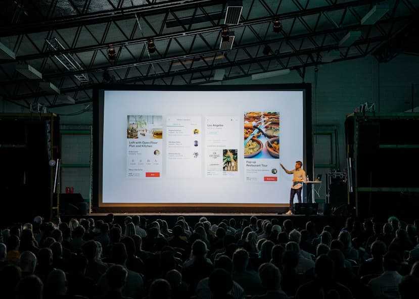 Speaker presenting to a full auditorium