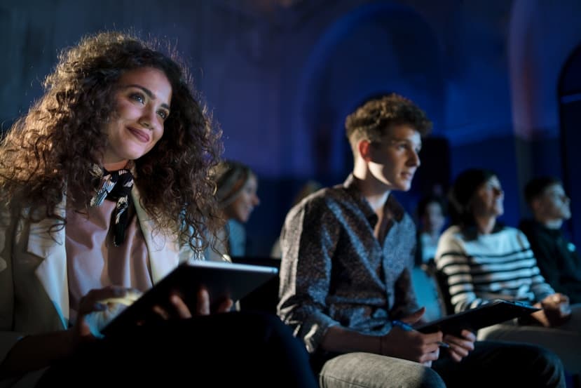 Attendees listening during a session